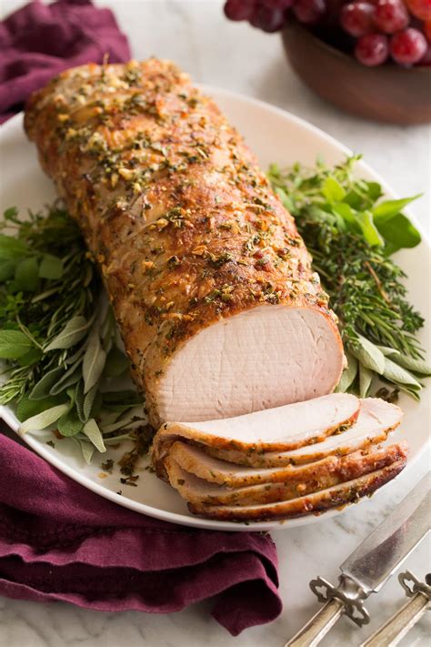 Instructions · Heat the oven. · Prep the ingredients. · Make a garlic paste. · Trim the silverskin from the pork loin and rub with garlic paste. ·...
